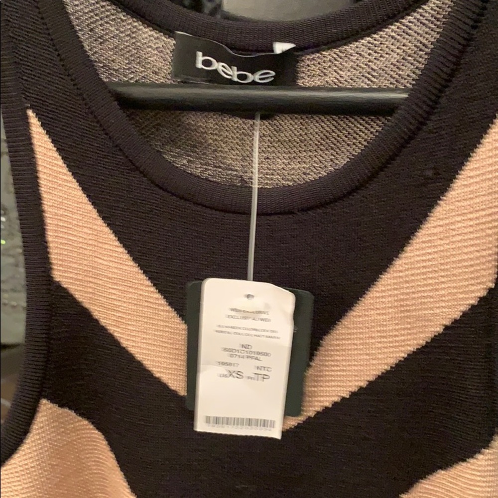 Bebe stretch material  xs with tags